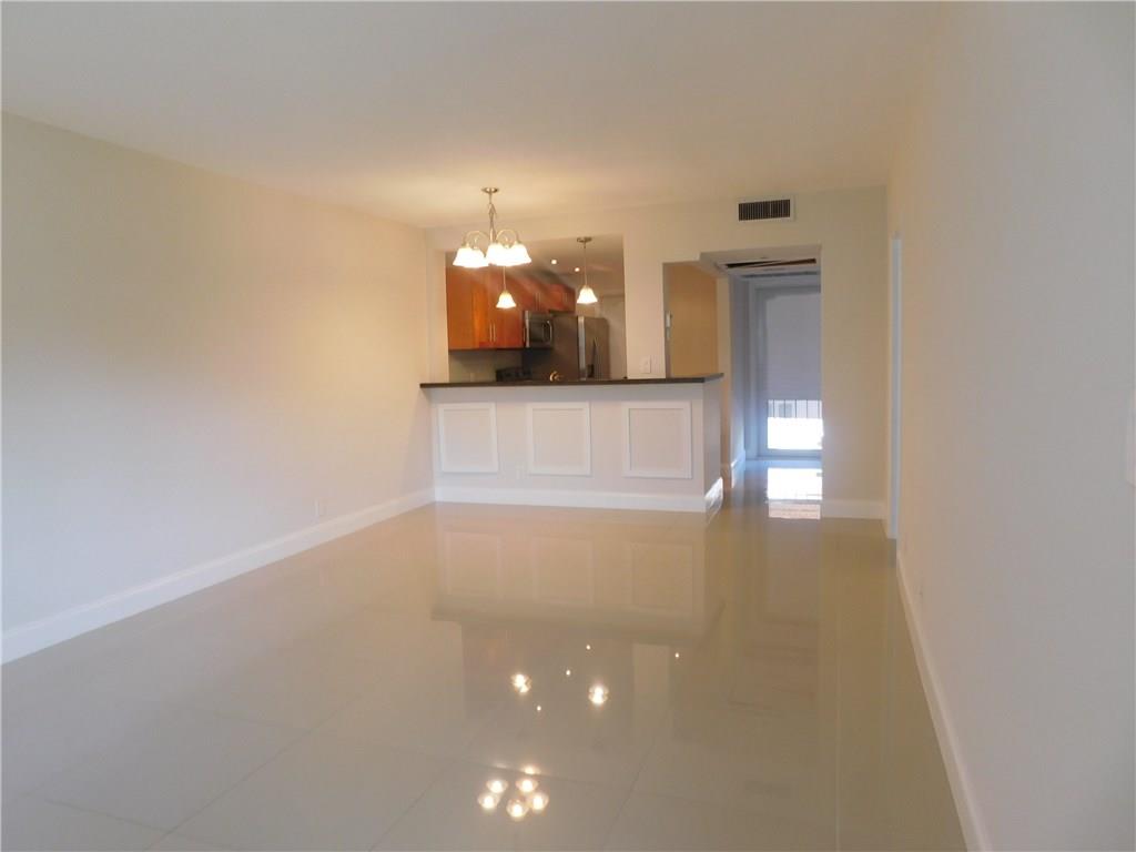 1481 South Ocean Boulevard, Unit 222B Pompano Beach, FL 33062 - Photo 13 of 28 a view of a hallway