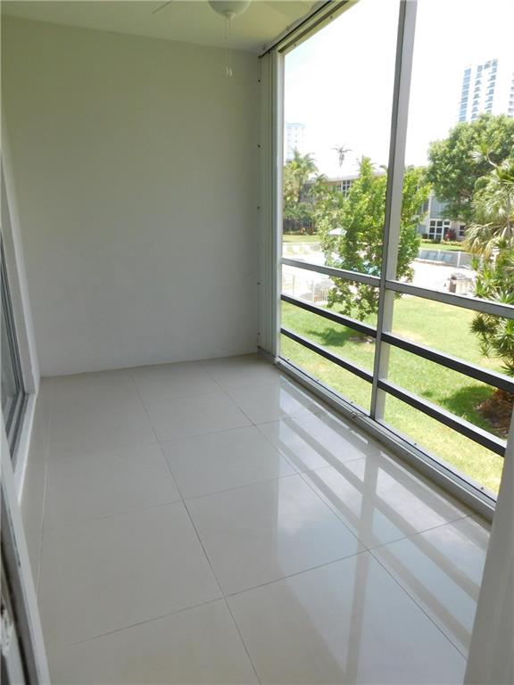 1481 South Ocean Boulevard, Unit 222B Pompano Beach, FL 33062 - Photo 16 of 28 a view of a room with a large window