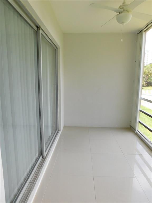 1481 South Ocean Boulevard, Unit 222B Pompano Beach, FL 33062 - Photo 17 of 28 an empty room with windows