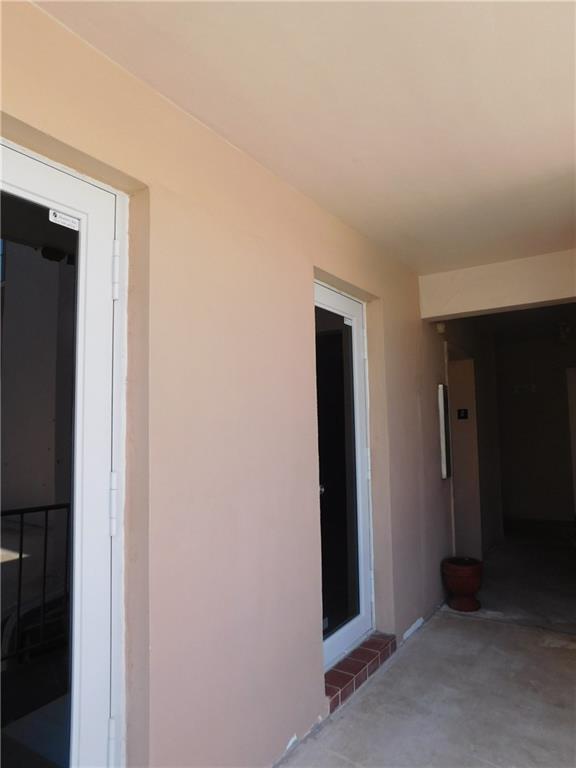 1481 South Ocean Boulevard, Unit 222B Pompano Beach, FL 33062 - Photo 23 of 28 a view of hallway with wooden floor