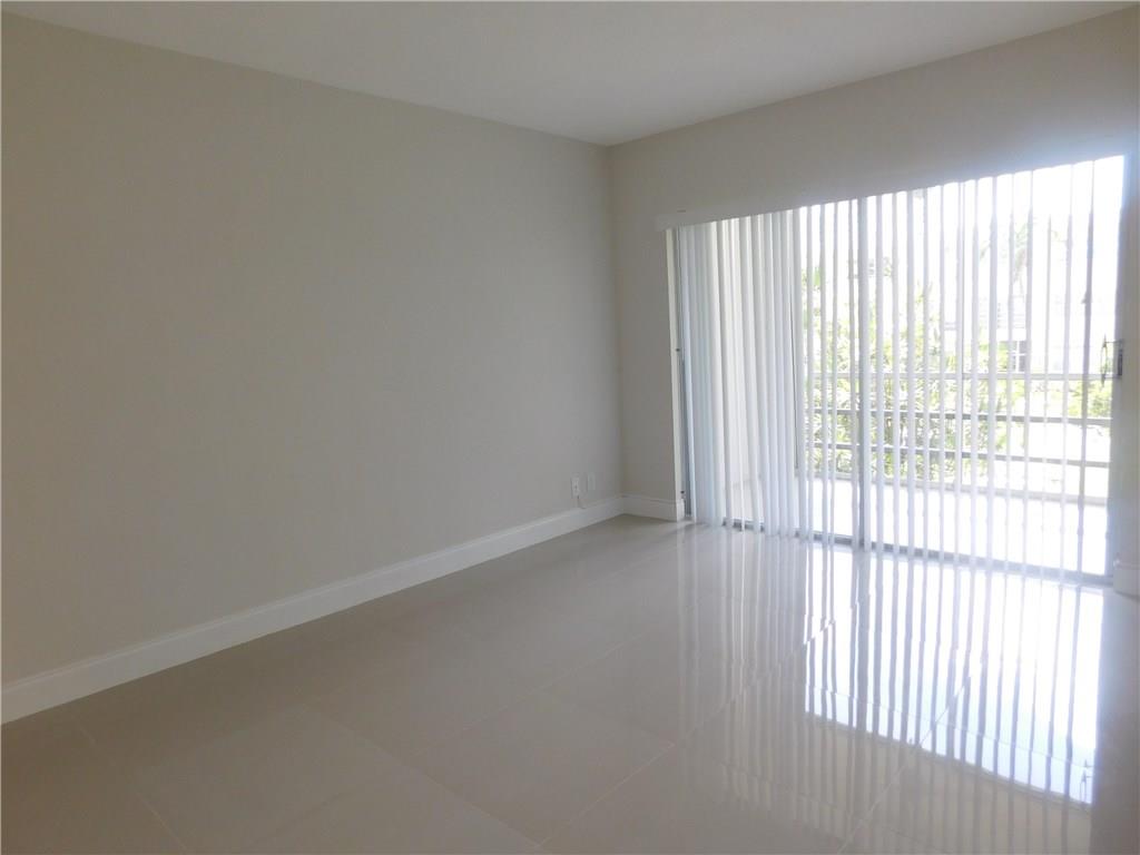 1481 South Ocean Boulevard, Unit 222B Pompano Beach, FL 33062 - Photo 26 of 28 a view of an empty room and window