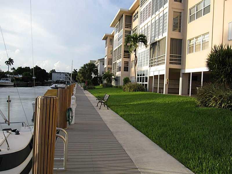 1481 South Ocean Boulevard, Unit 222B Pompano Beach, FL 33062 - Photo 4 of 28 a view of a building with many windows
