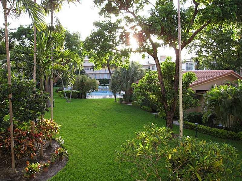 1481 South Ocean Boulevard, Unit 222B Pompano Beach, FL 33062 - Photo 5 of 28 a view of a garden with plants
