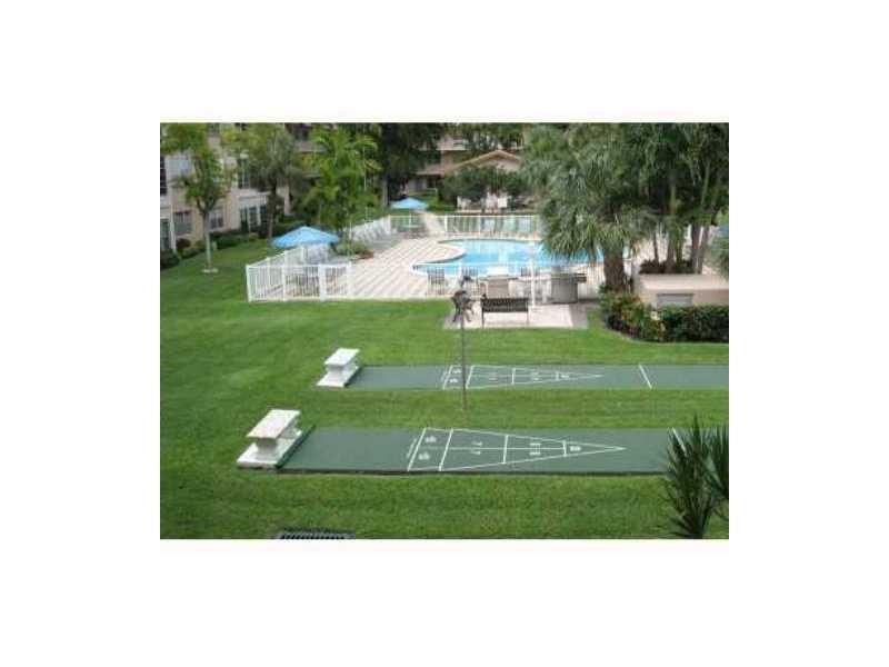 1481 South Ocean Boulevard, Unit 222B Pompano Beach, FL 33062 - Photo 8 of 28 a view of a backyard