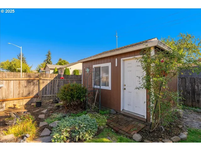 a backyard of a house with lots of green space