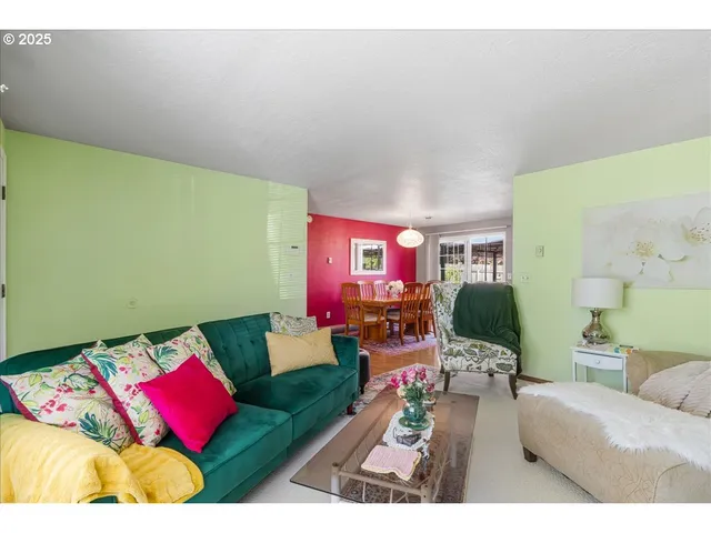 a living room with furniture and a couch