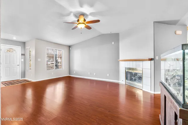 a kitchen with stainless steel appliances granite countertop wooden cabinets stove top oven and sink