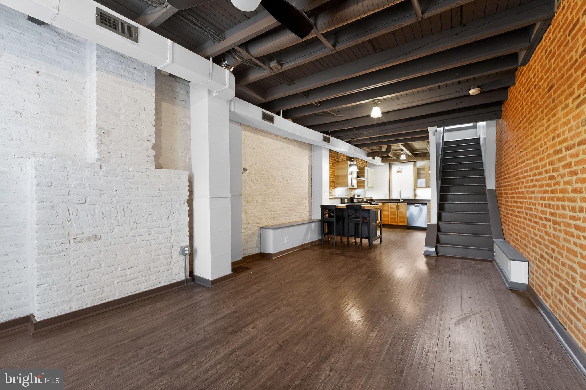 1602 Latrobe Street Baltimore, MD 21202 - Photo 11 of 15 Spacious urban loft with exposed brick charm.