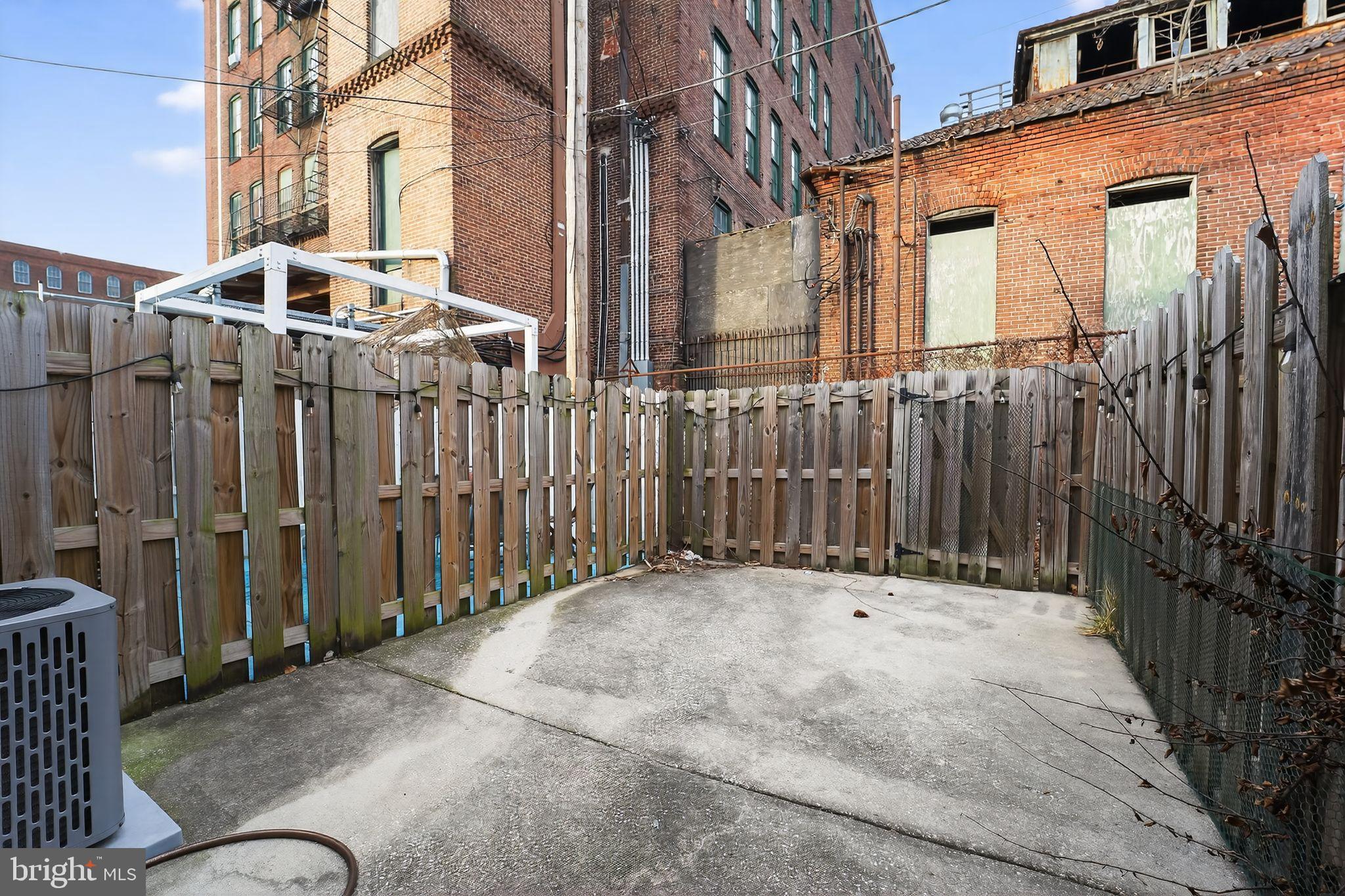 1602 Latrobe Street Baltimore, MD 21202 - Photo 3 of 15 Urban retreat with fenced outdoor space.