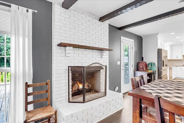 a view of a bathroom with a tub shower and a sink