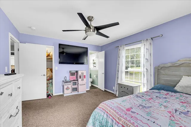 a view of a house next to a yard