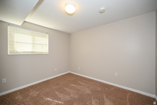 916 Vics Road, Unit 2 Sandy, UT 84094 - Photo 15 of 23 Neutral-toned wall finishes with white trim
