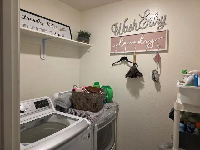 a bed room with a bed and a desk