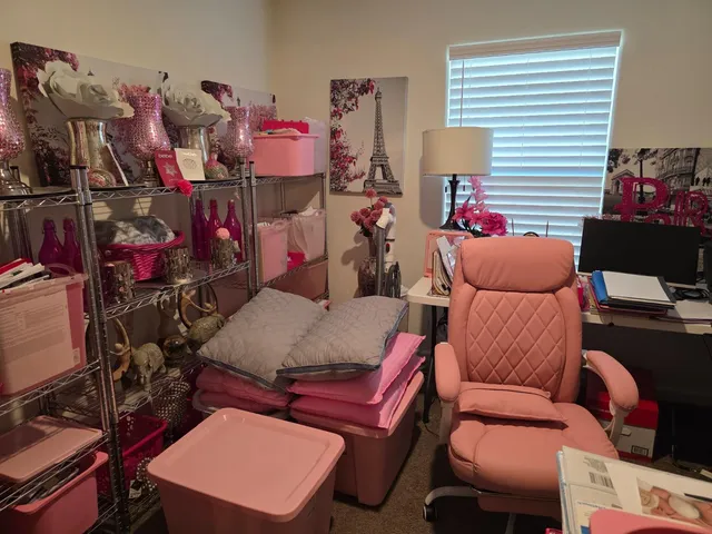 a room with furniture toys and a window