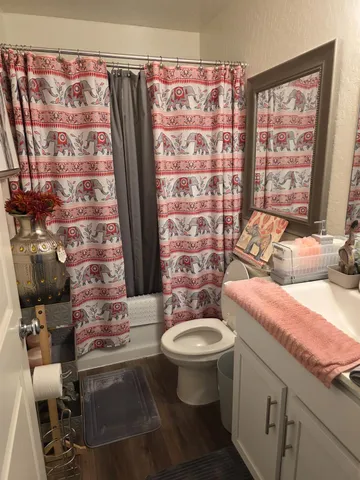 a kitchen with a sink stove and refrigerator
