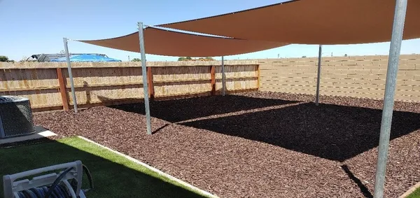 a view of a backyard with plants