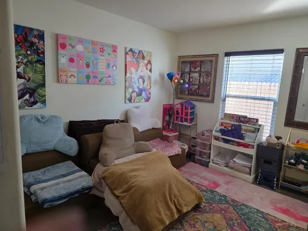 a living room with furniture and a couch