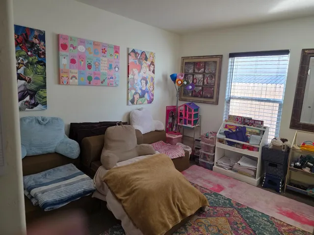 a living room with furniture and a couch
