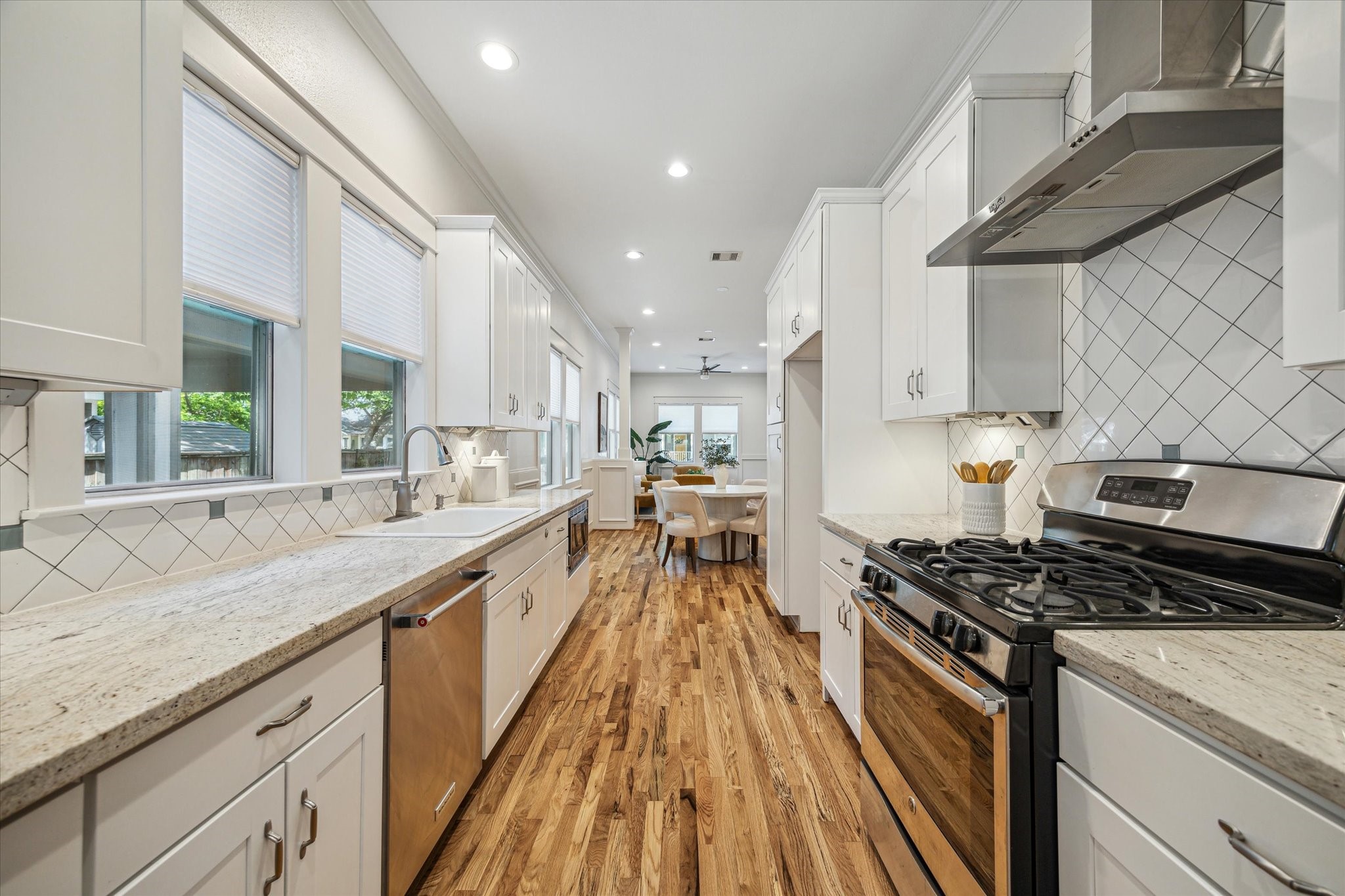 1833 Tabor Street Houston, TX 77009 - Photo 11 of 28 An updated chef's kitchen. Modern appliances, cabinets, and sleek look.