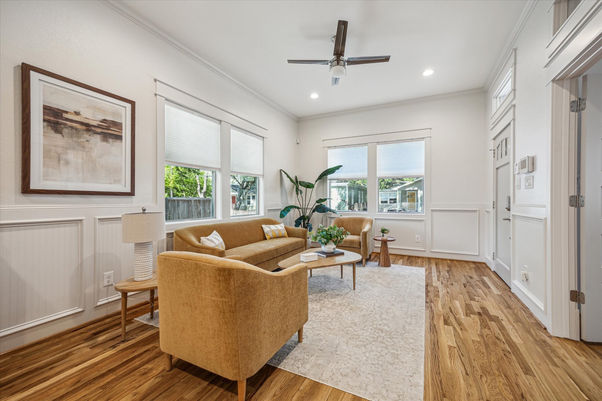 1833 Tabor Street Houston, TX 77009 - Photo 6 of 28 Sunlit front living room with two large windows overlooking oak-lined Tabor Street