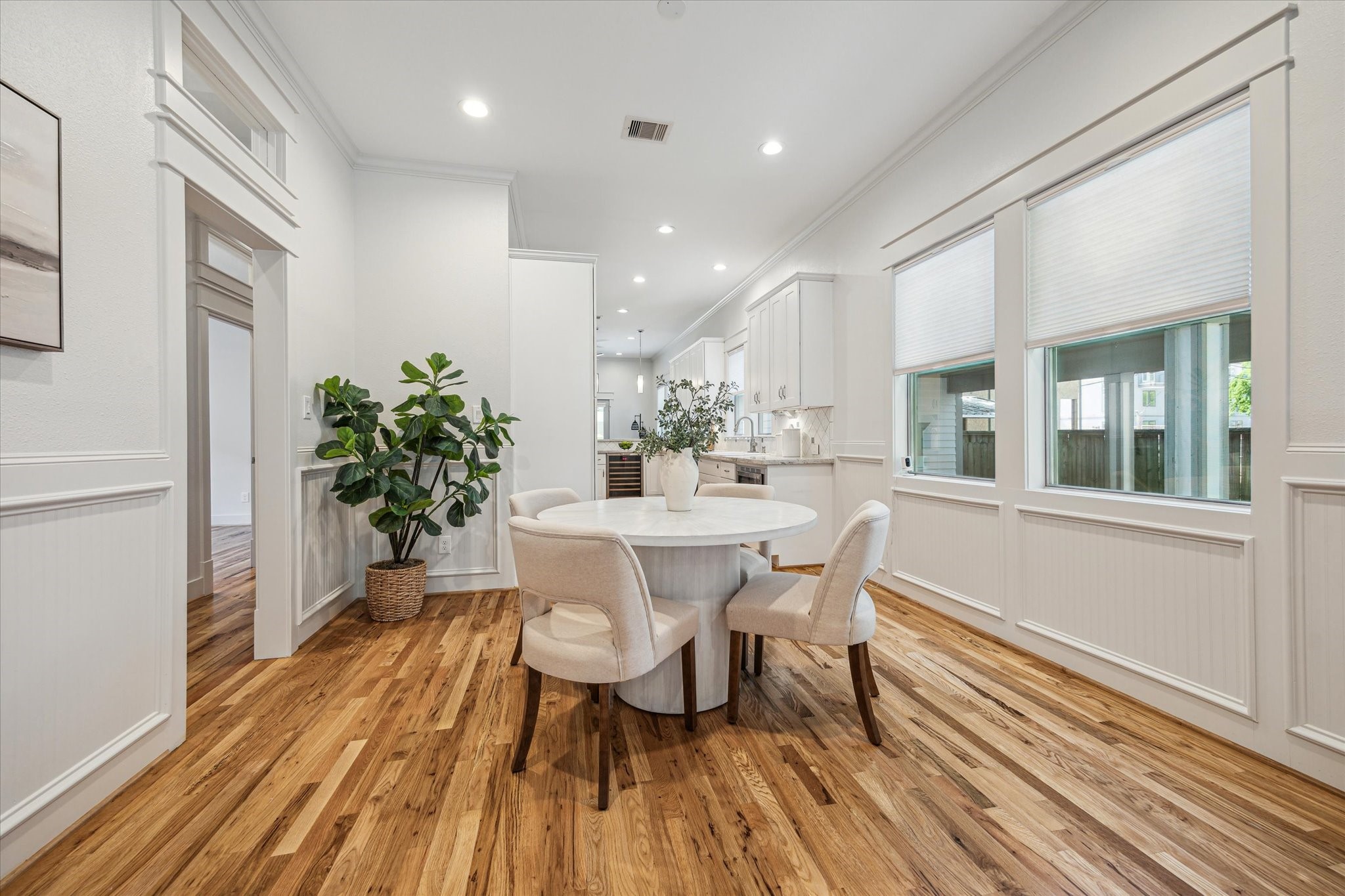 1833 Tabor Street Houston, TX 77009 - Photo 9 of 28 The dining room is in the center of the home