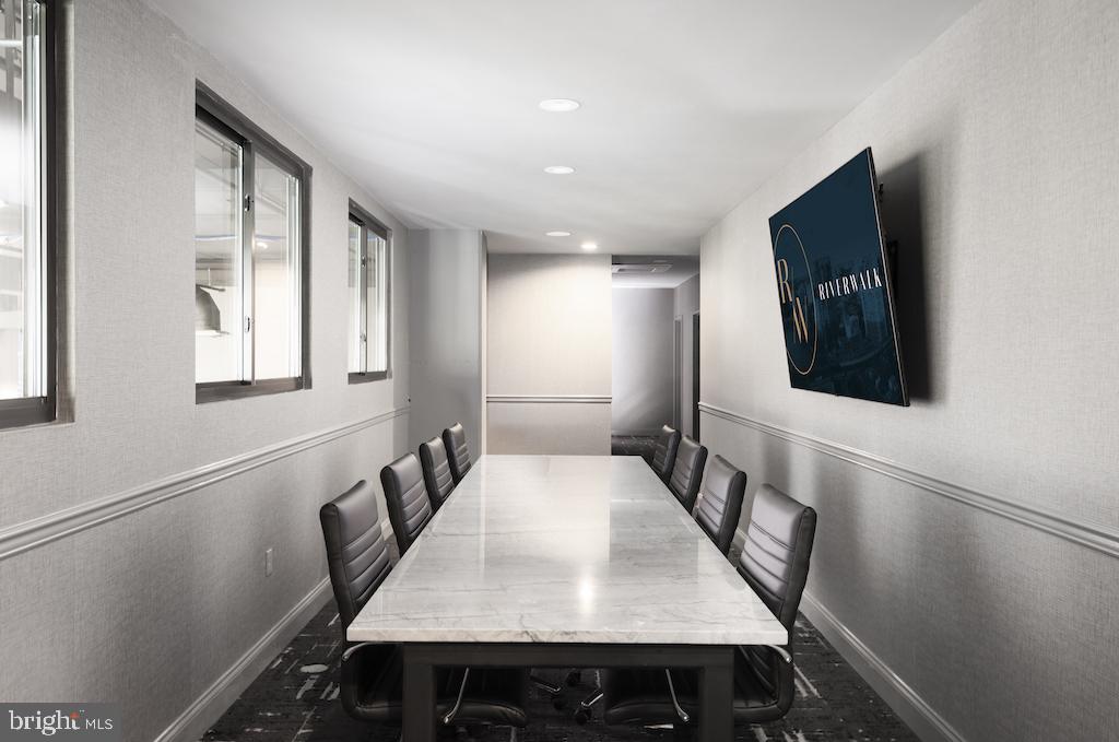 30 North 23rd Street, Unit 2009 Philadelphia, PA 19103 - Photo 33 of 42 a view of a hallway with furniture and wooden floor