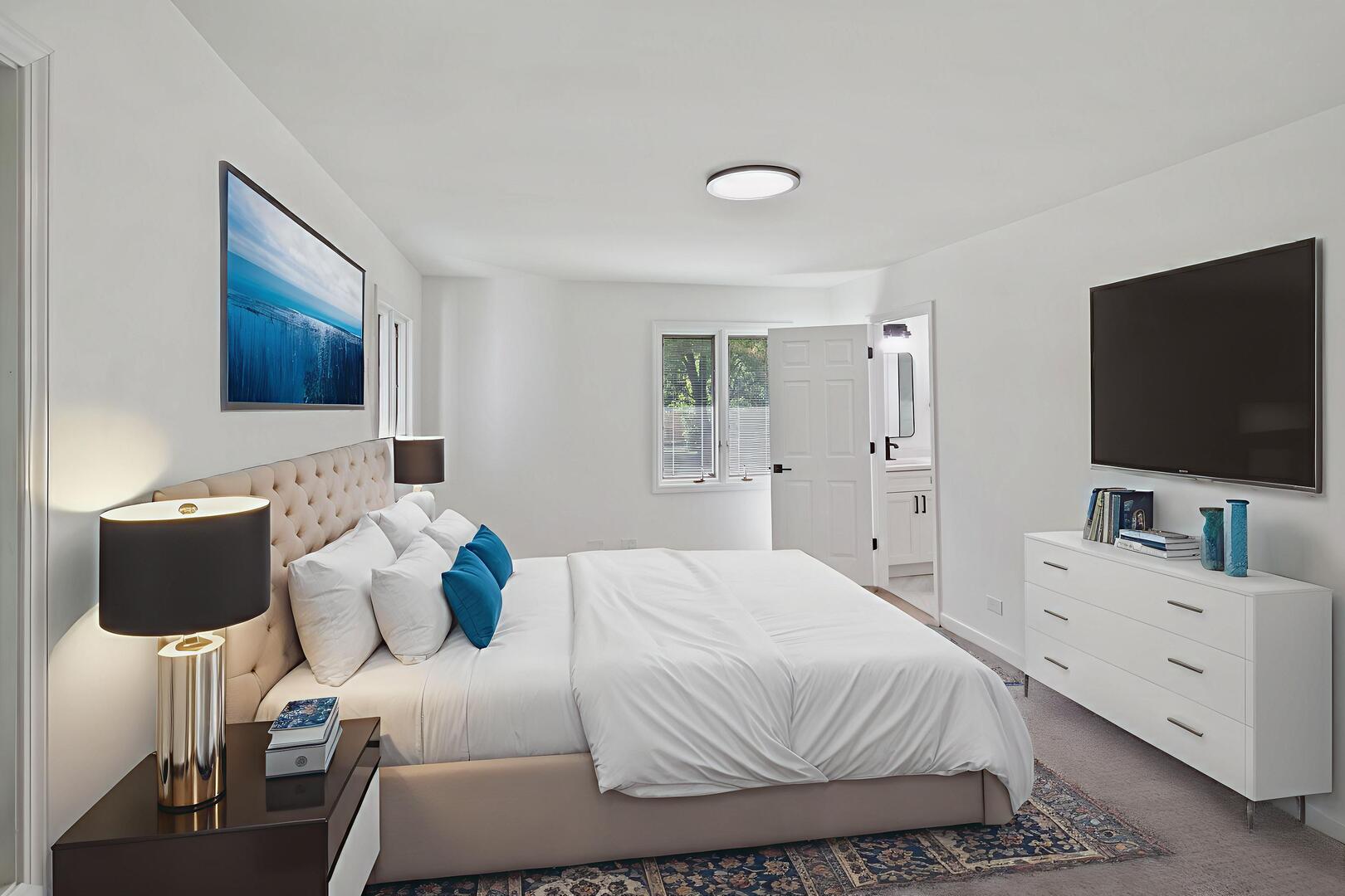 185 Cold Spring Road Barrington, IL 60010 - Photo 18 of 40 a bedroom with a bed and a flat screen tv