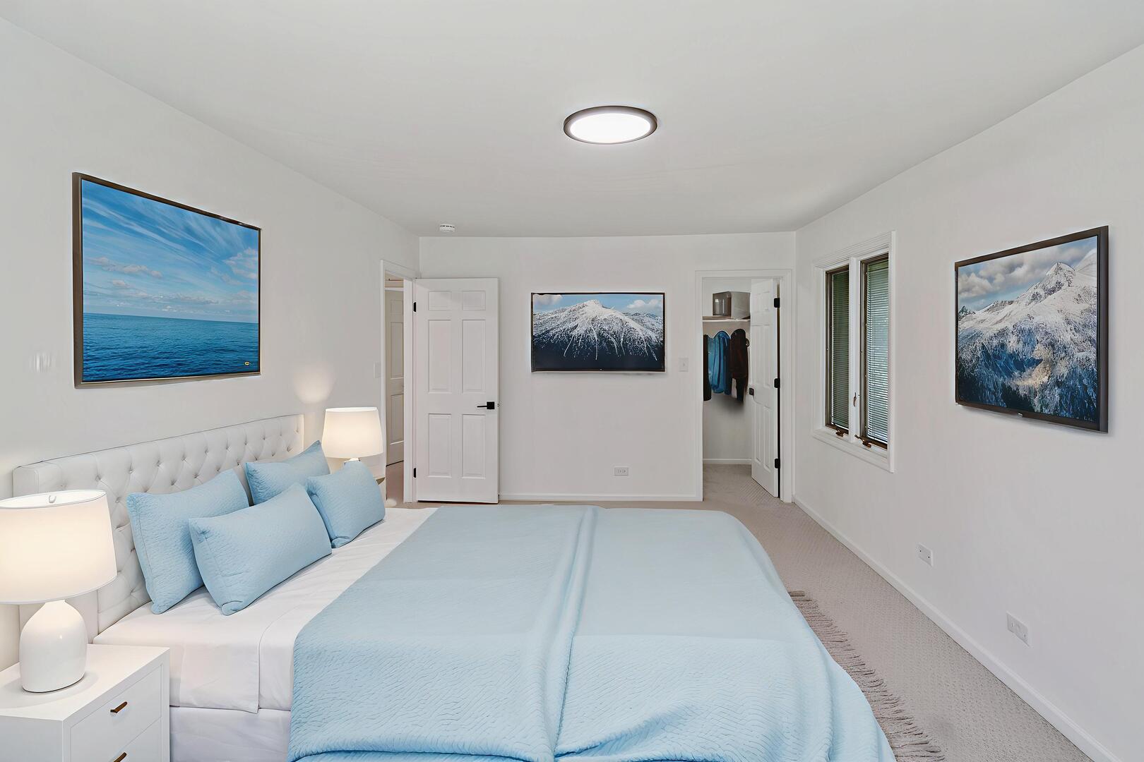 185 Cold Spring Road Barrington, IL 60010 - Photo 19 of 40 a spacious bedroom with a bed and a flat screen tv