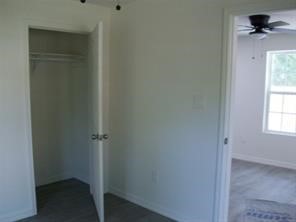 1714 North Travis Avenue Cleveland, TX 77327 - Photo 3 of 8 a view of an empty room