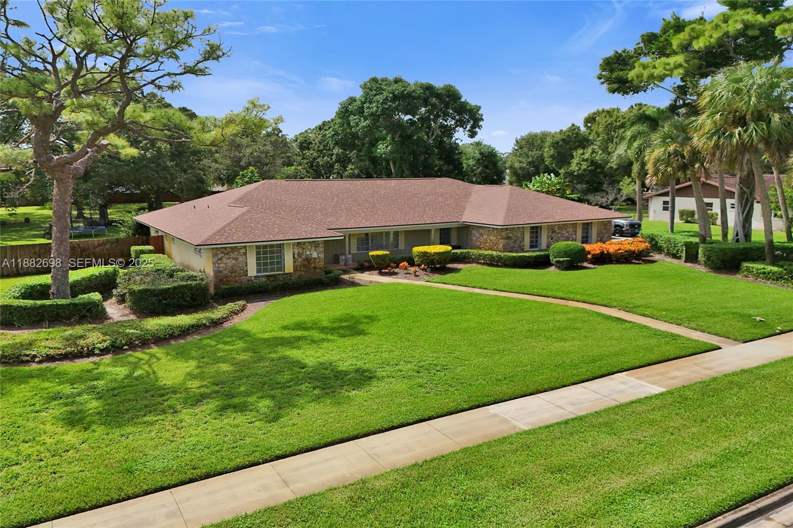 1021 Grandview Boulevard Fort Pierce, FL 34982 - Photo 1 of 34 a view of an house with backyard space and garden