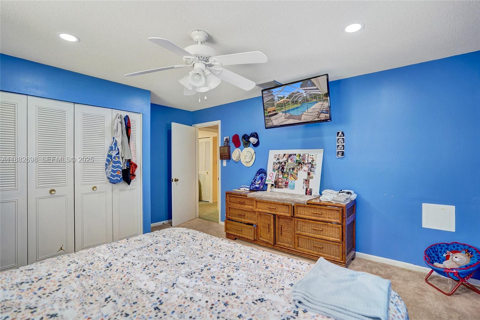 1021 Grandview Boulevard Fort Pierce, FL 34982 - Photo 11 of 34 a bedroom with a bed and furniture