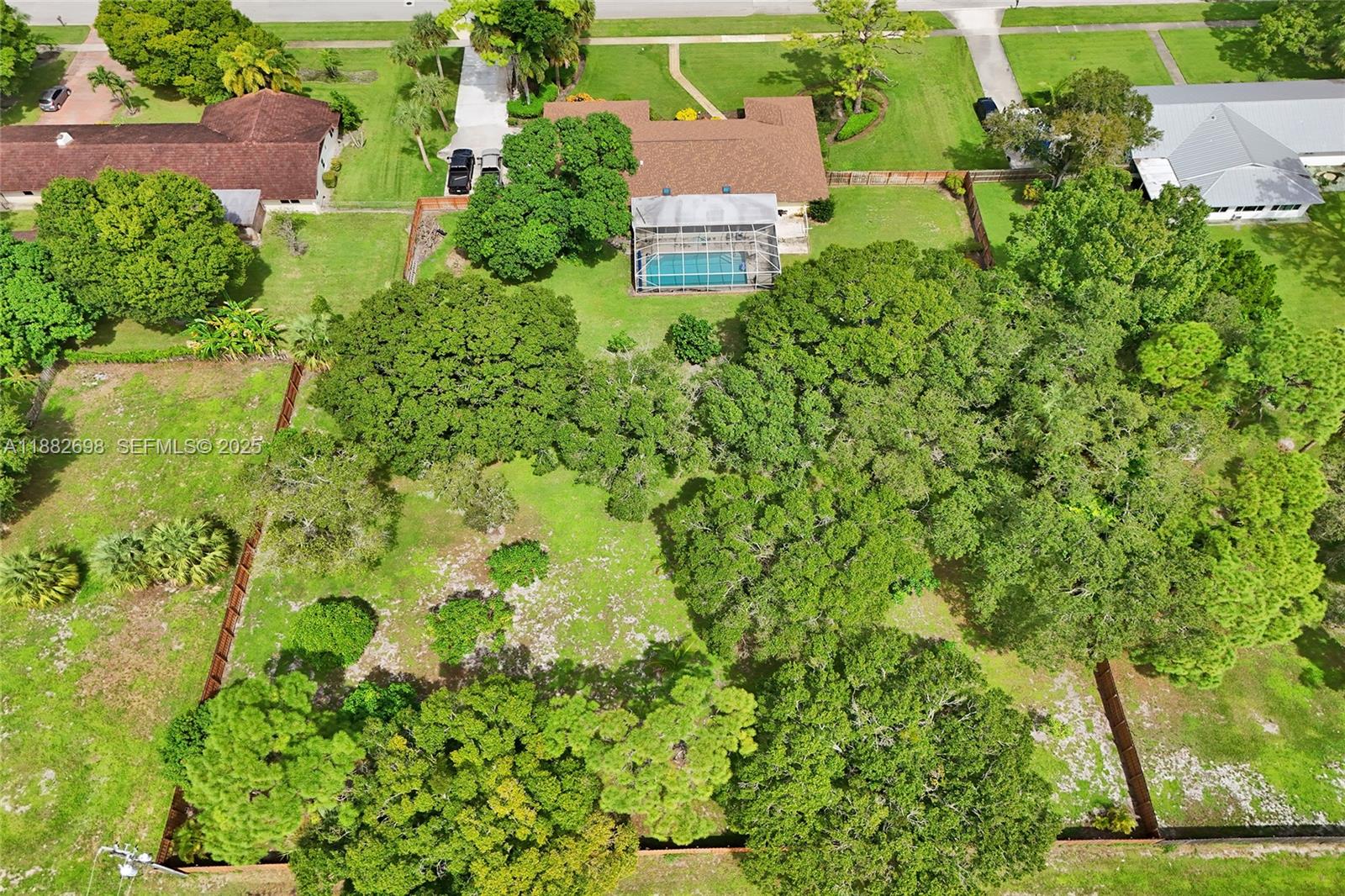 1021 Grandview Boulevard Fort Pierce, FL 34982 - Photo 32 of 34 an aerial view of a house with a yard