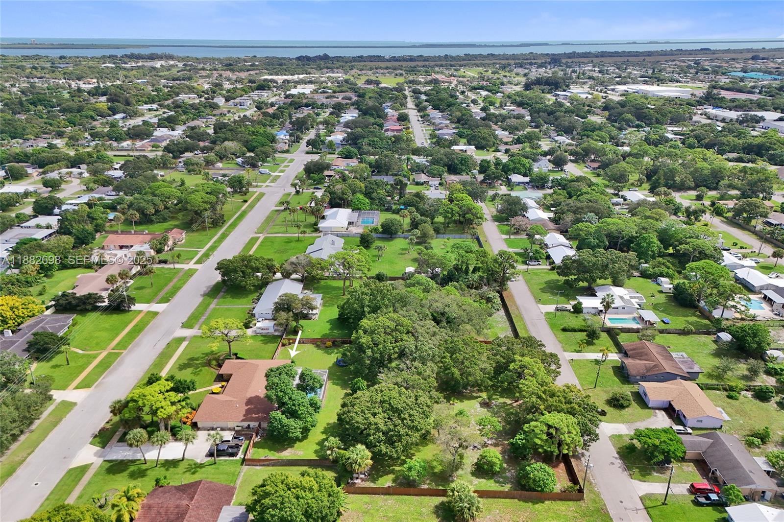 1021 Grandview Boulevard Fort Pierce, FL 34982 - Photo 34 of 34 an aerial view of a city with lots of residential buildings