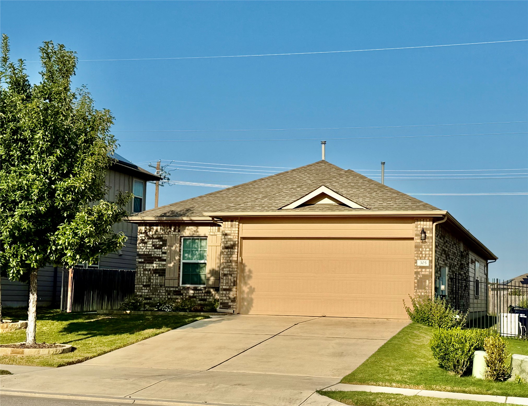 305 Rusk Bluff Avenue Leander, TX 78641 - Photo 6 of 34 2 car attached garage
