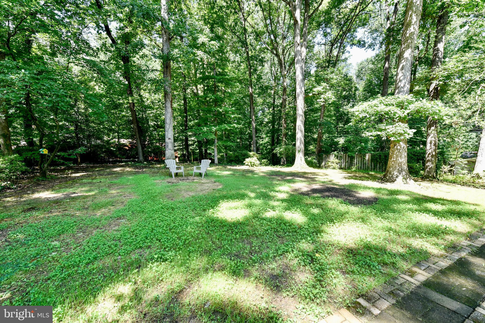 5012 Dodson Drive Annandale, VA 22003 - Photo 31 of 44 a backyard of a house with lots of green space