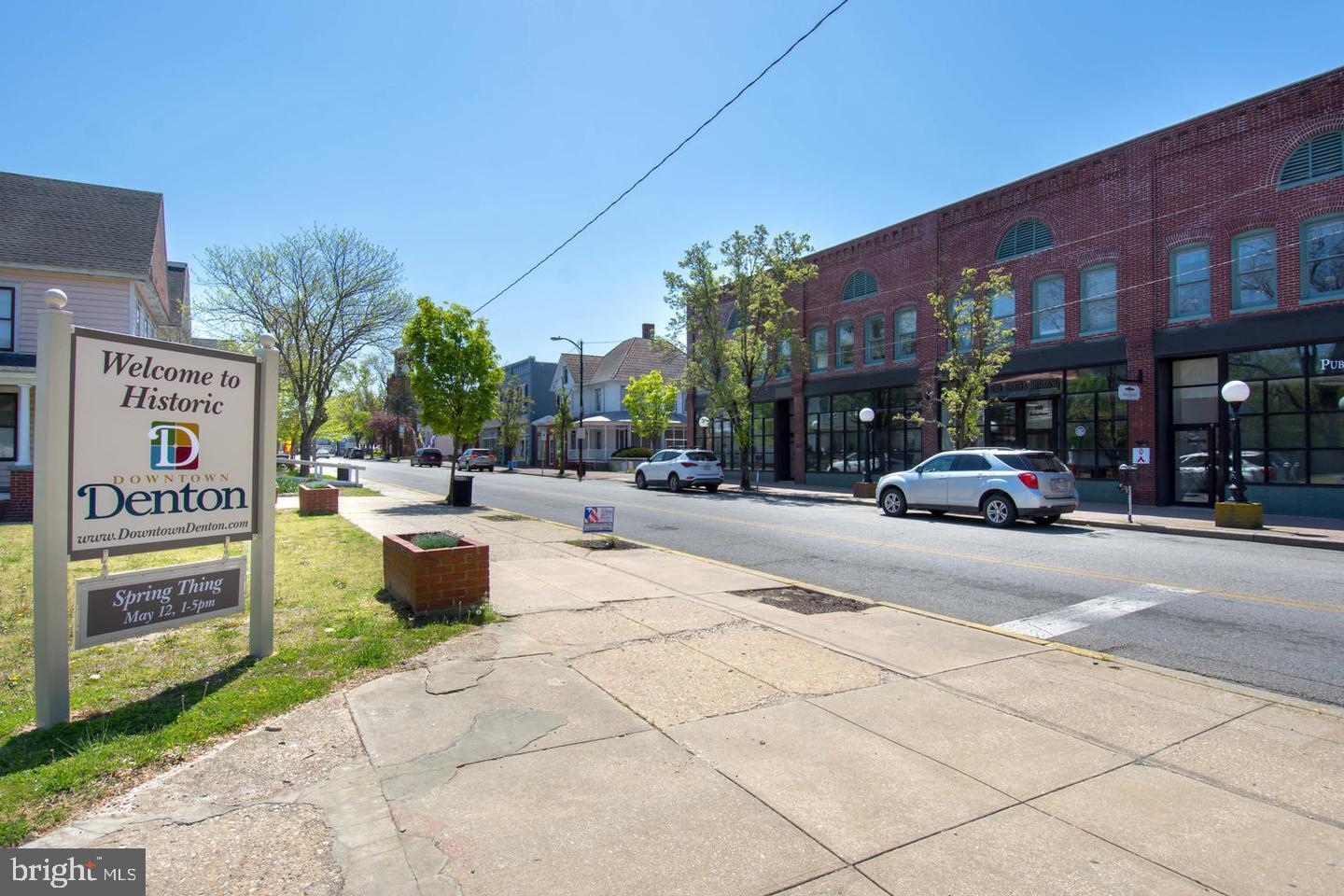 8320 Detour Road Denton, MD 21629 - Photo 9 of 14 a building with trees in front of it