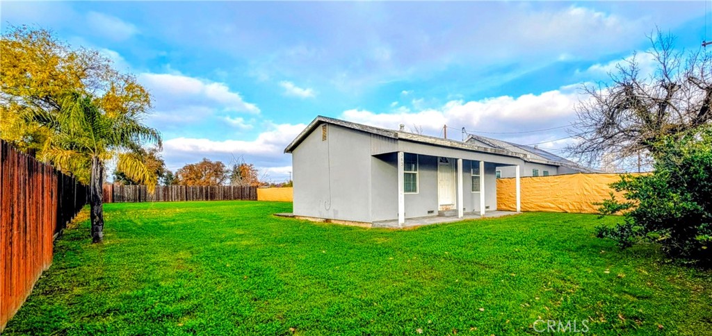 363 Ford Road Sacramento, CA 95838 - Photo 7 of 23 a backyard of a house with lots of green space