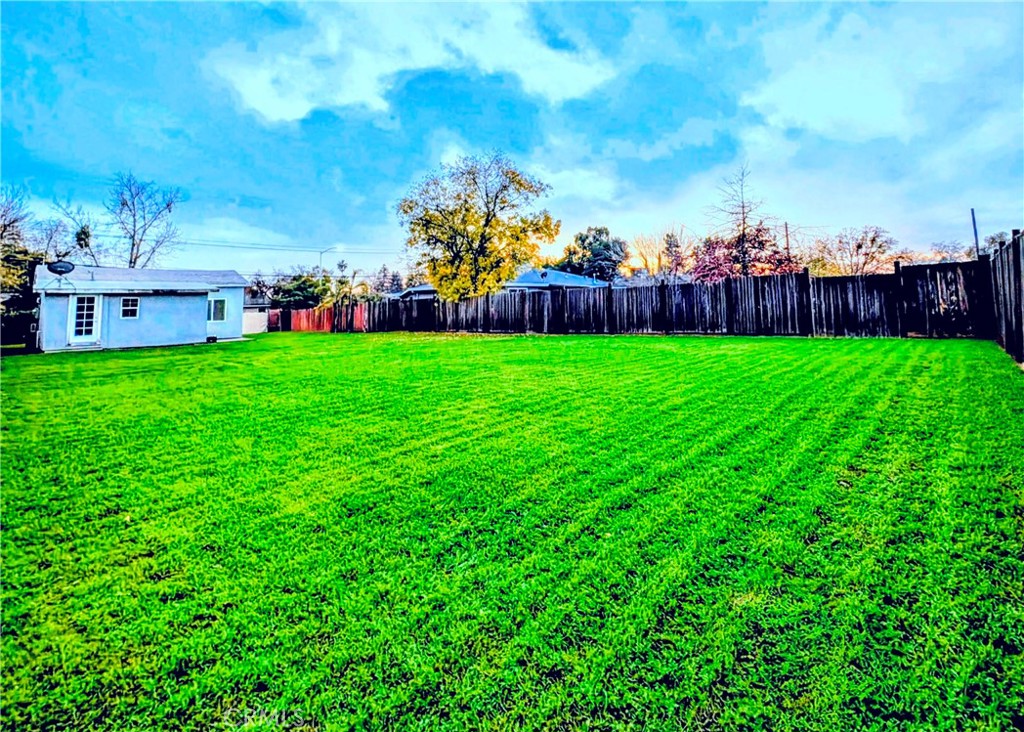 363 Ford Road Sacramento, CA 95838 - Photo 9 of 23 a view of a garden with a building in the background