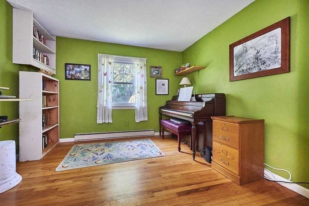 1021 Burts Pit Road Northampton, MA 01062 - Photo 19 of 33 a living room with furniture and a window