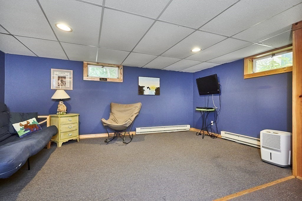 1021 Burts Pit Road Northampton, MA 01062 - Photo 23 of 33 a view of a livingroom with workspace and a couch
