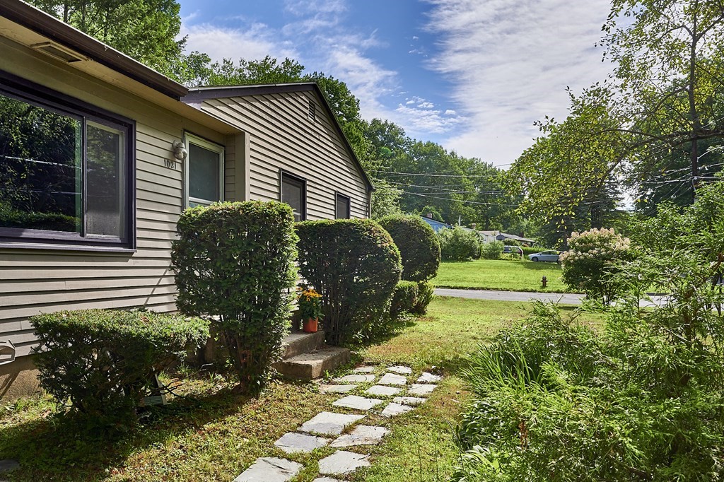 1021 Burts Pit Road Northampton, MA 01062 - Photo 3 of 33 a front view of a house with a yard