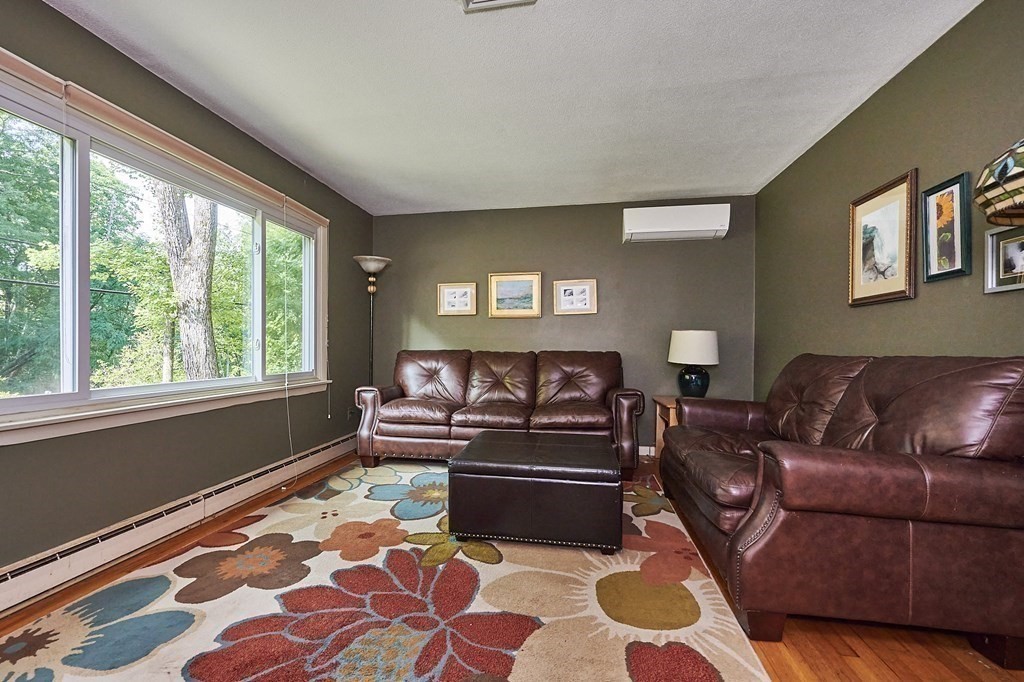 1021 Burts Pit Road Northampton, MA 01062 - Photo 10 of 33 a living room with furniture and a rug