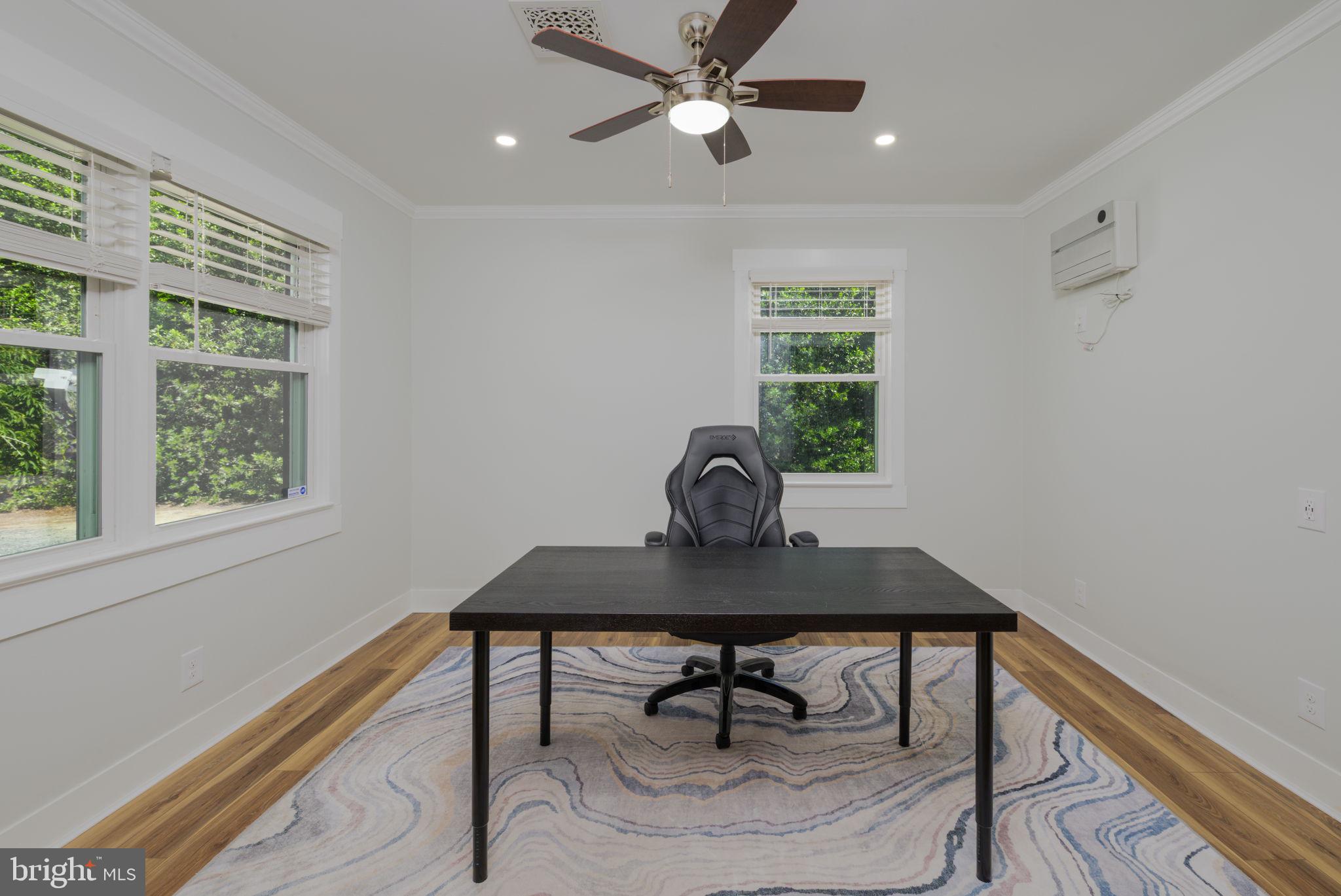 4563 Nutters Cross Road Salisbury, MD 21804 - Photo 41 of 52 a view of a workspace with a window and furniture