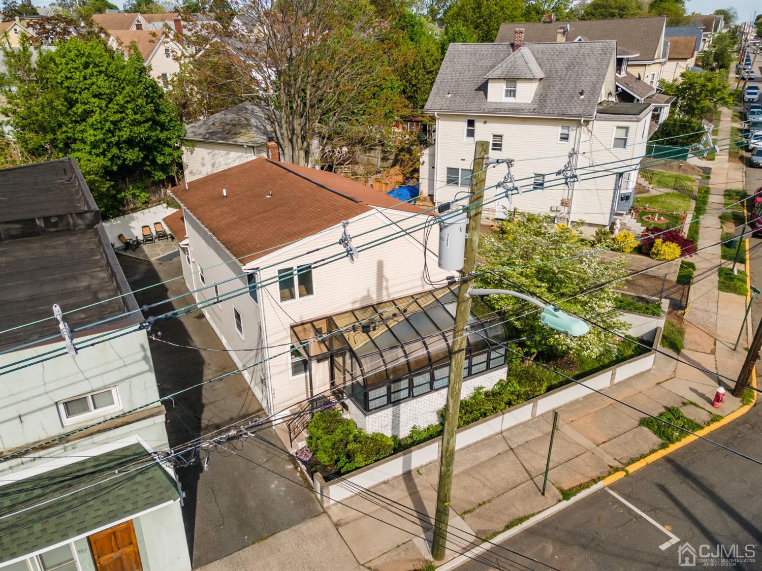 383 Paterson Avenue East Rutherford, NJ 07073 - Photo 21 of 21 an aerial view of a house with a yard