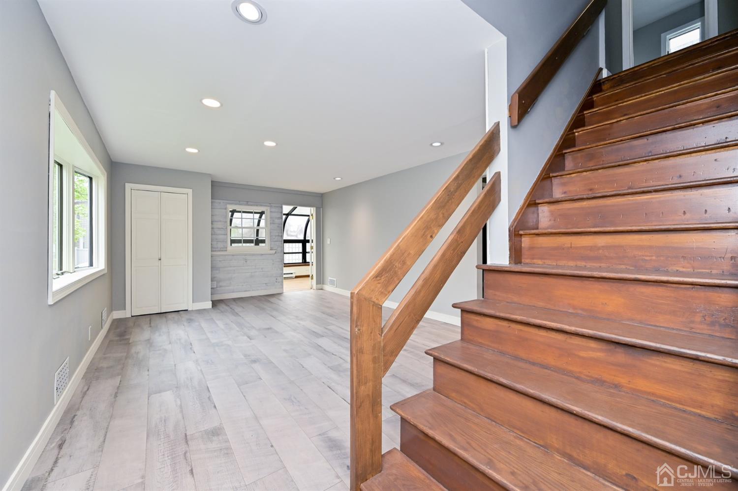 383 Paterson Avenue East Rutherford, NJ 07073 - Photo 8 of 21 a view of entryway and hall with wooden floor