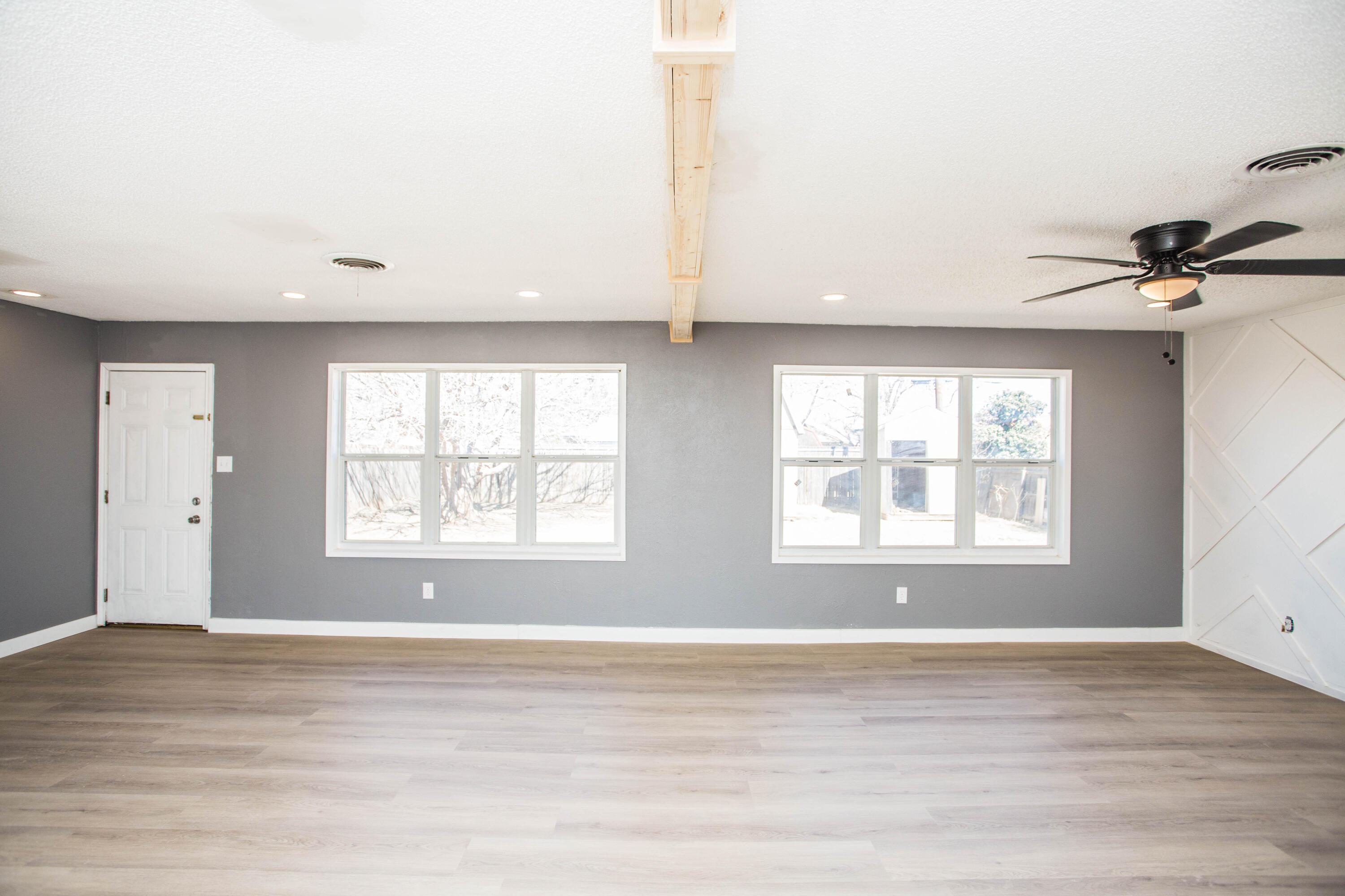 5212 41st Street Lubbock, TX 79414 - Photo 14 of 35 a view of an empty room with a window