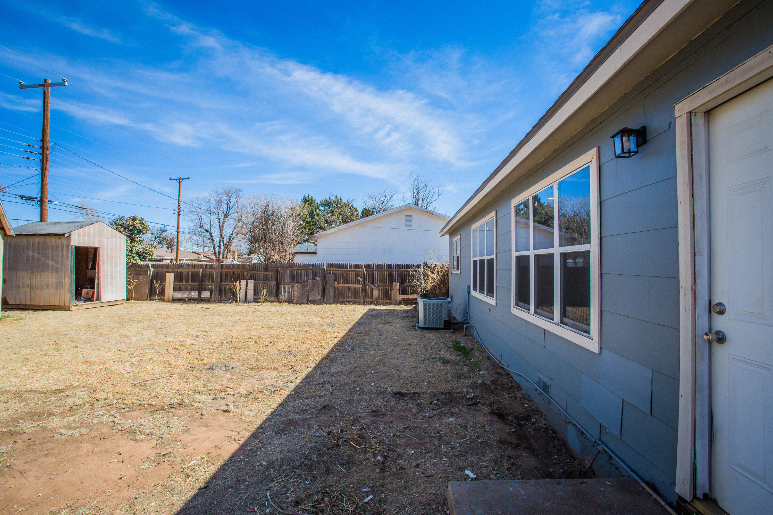 5212 41st Street Lubbock, TX 79414 - Photo 34 of 35 a house with trees in front of it