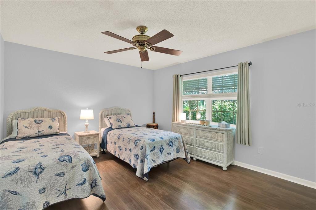 5 Balsam Court South Homosassa, FL 34446 - Photo 14 of 35 a bedroom with two beds and a window