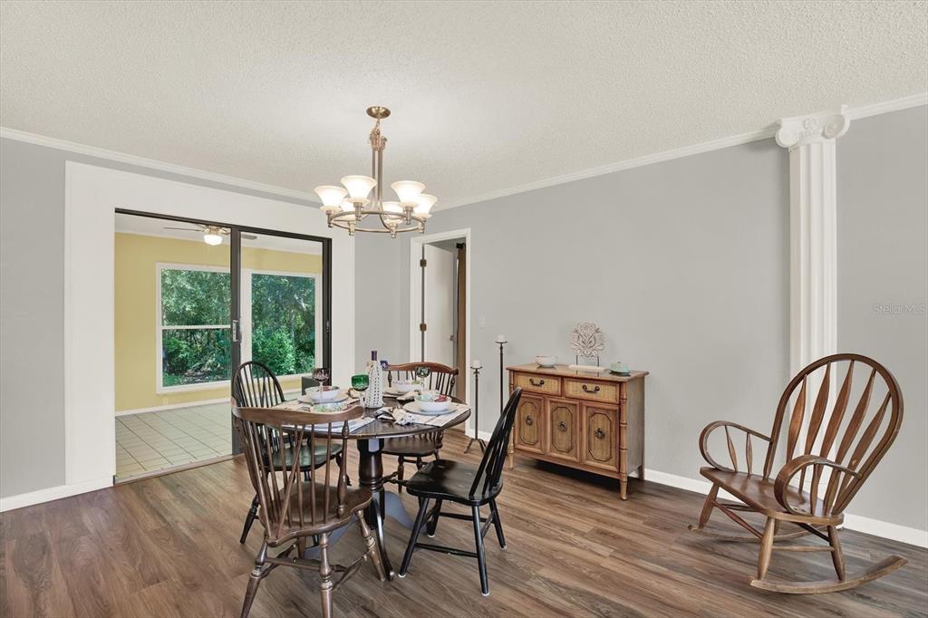 5 Balsam Court South Homosassa, FL 34446 - Photo 19 of 35 a view of a dining room with furniture window and outside view
