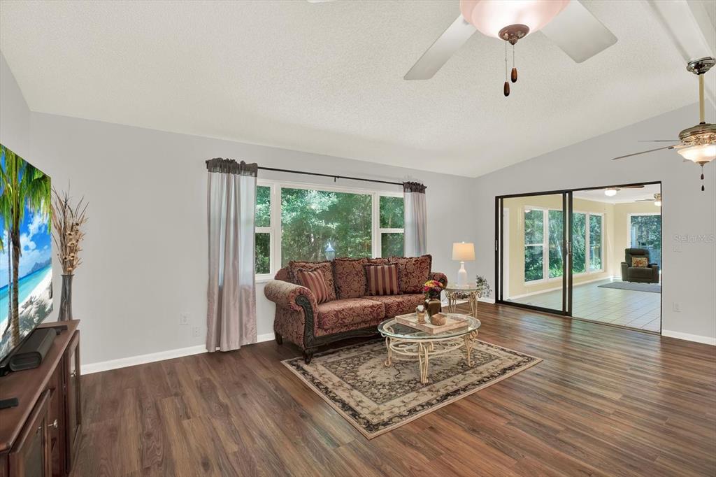 5 Balsam Court South Homosassa, FL 34446 - Photo 8 of 35 a living room with furniture and a flat screen tv